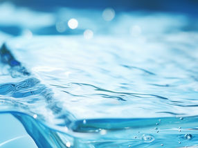 Water films – the silent architects of chemical transformations